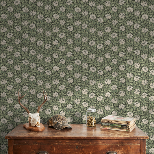 Forest green wallpaper with watercolor roses in rustic room setting.