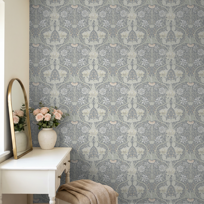 Honeysuckle floral wallpaper in cool tones with vintage vanity and flowers.