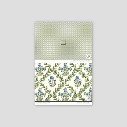 Hydrangea Trellis Ivory wallpaper with blue flowers and green leaves on a lattice pattern.