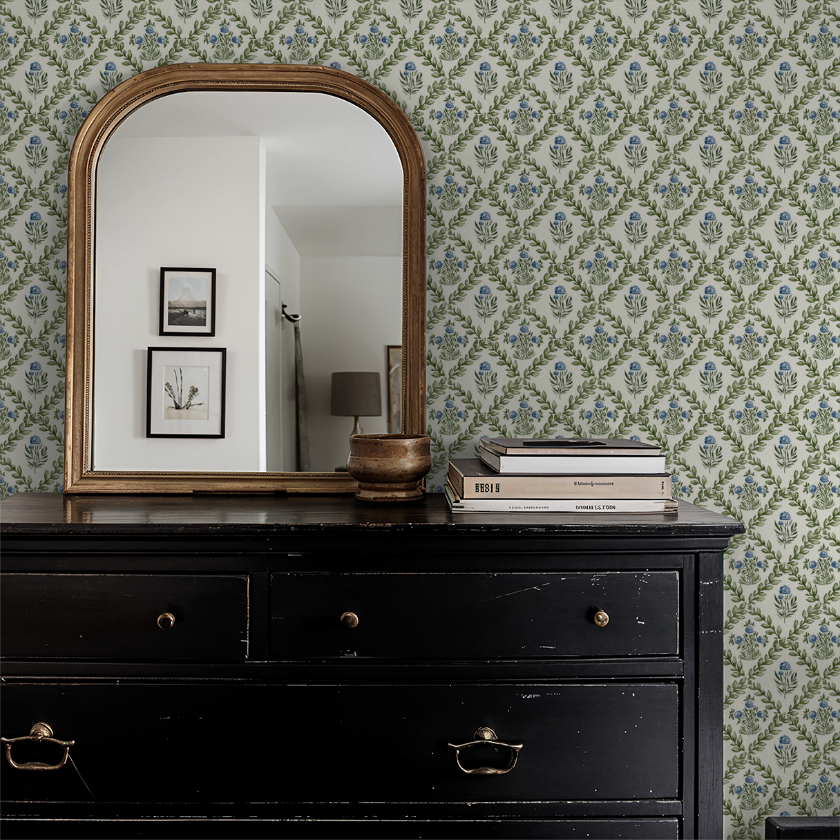 Ivory wallpaper with green lattice and blue blossoms in a vintage room setting.