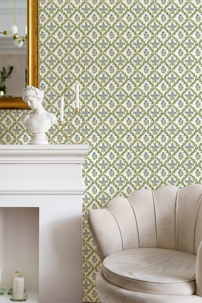 Ivory wallpaper with green trellis and blue flowers in elegant living room setting.