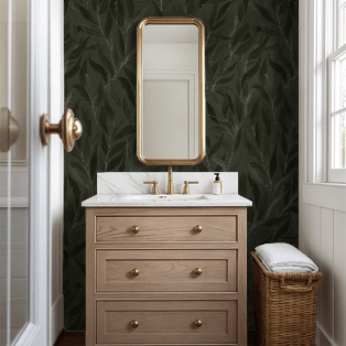 Bathroom with wooden vanity, mirror, and leaf-patterned wallpaper