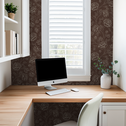Rustic brown floral wallpaper in a cozy home office with desk and computer.