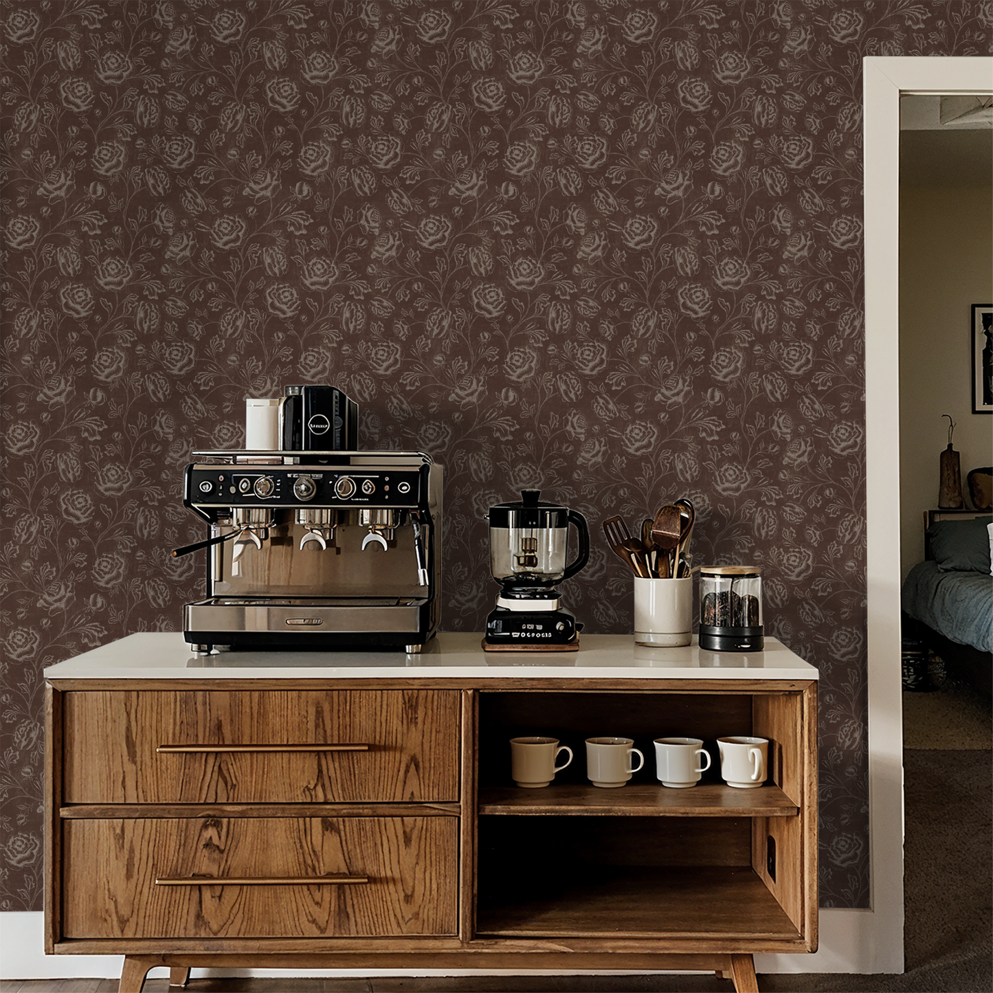 Rustic brown floral wallpaper in a cozy kitchen setting with wooden cabinetry.